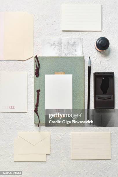 japanese notepad, brush, black ink, cards, letters. vintage style. ancient antique items for calligraphy - accounting ledger stock pictures, royalty-free photos & images