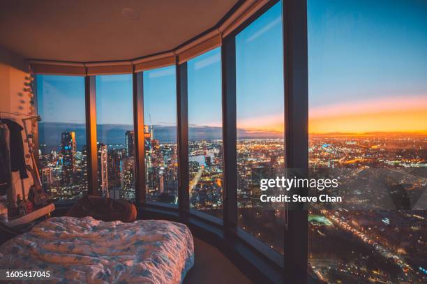 city view at dusk from a high rise apartment - team sport australia stock pictures, royalty-free photos & images