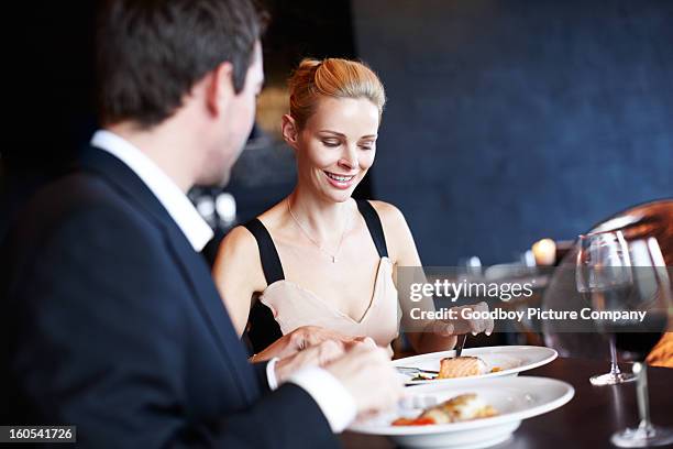 how is your meal? - elegant couple stockfoto's en -beelden