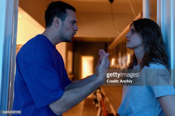 close-up of a man and woman arguing - wife stock pictures, royalty-free photos & images