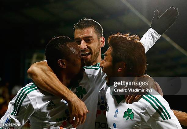 Ibrahim Sissoko is celebrated by his team mates Giorgos Seitaridis and Yohei Kajiyama after scoring his team's first goal during the Superleague...