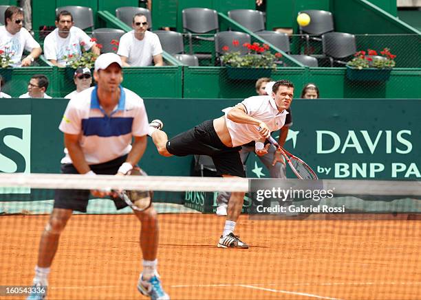 Christopher Kas and Tobias Kamke of Germany in action during the match against David Nalbandian and Horacio Zeballos of Argentina on the second day...