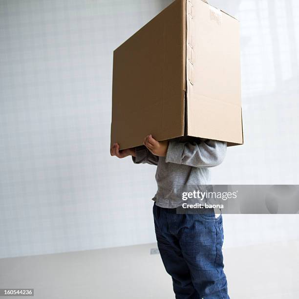 Hiding In Box 1,530 Person Hiding In Box Stock Photos, High-Res Pictures, and Images ...
