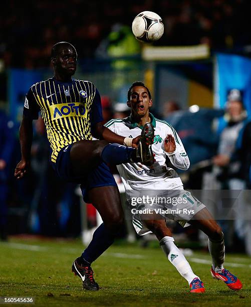 Toche of Panathinaikos and Khalifa Sankare of Tripolis battle for the ball during the Superleague match between Asteras Tripolis and Panathinaikos FC...