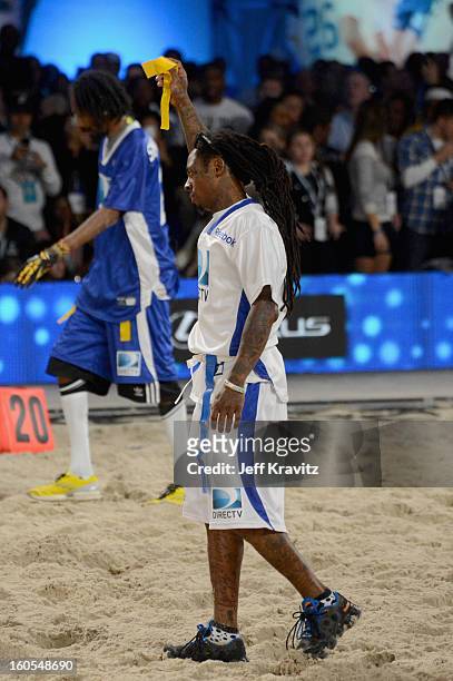 Rapper Lil Wayne attends DIRECTV'S 7th Annual Celebrity Beach Bowl at DTV SuperFan Stadium at Mardi Gras World on February 2, 2013 in New Orleans,...
