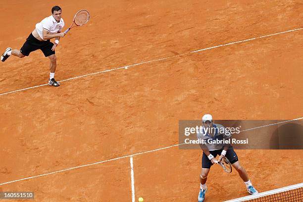 Christopher Kas and Tobias Kamke of Germany in action during the match against David Nalbandian and Horacio Zeballos of Argentina on the second day...