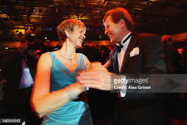 Susanne Klatten and her husband Jan Klatten dance during the 'Ball des Sports 2013' at Rhein-Main-Hallen on February 2, 2013 in Wiesbaden, Germany.