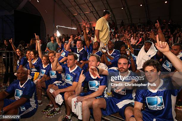 The Blue Team celebrates at DIRECTV'S Seventh Annual Celebrity Beach Bowl at DTV SuperFan Stadium at Mardi Gras World on February 2, 2013 in New...