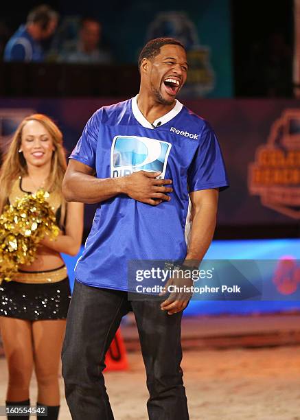 Michael Strahan attends DIRECTV'S Seventh Annual Celebrity Beach Bowl at DTV SuperFan Stadium at Mardi Gras World on February 2, 2013 in New Orleans,...