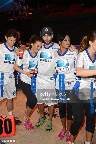 Christine Teigen and Chace Crawford attend DIRECTV'S Seventh Annual Celebrity Beach Bowl at DTV SuperFan Stadium at Mardi Gras World on February 2,...
