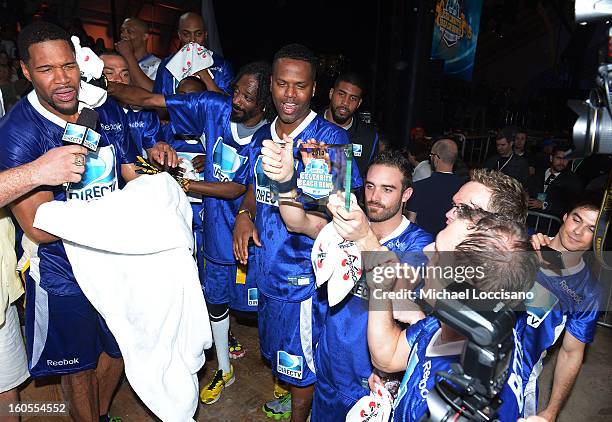 Michael Strahan attends DIRECTV'S Seventh Annual Celebrity Beach Bowl at DTV SuperFan Stadium at Mardi Gras World on February 2, 2013 in New Orleans,...