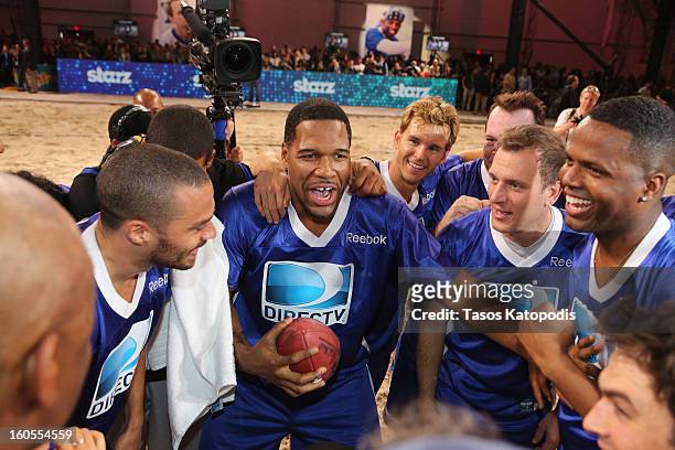 Michael Strahan attends DIRECTV'S Seventh Annual Celebrity Beach Bowl at DTV SuperFan Stadium at Mardi Gras World on February 2, 2013 in New Orleans,...