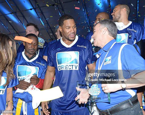 Player Michael Strahan attends DIRECTV'S Seventh Annual Celebrity Beach Bowl at DTV SuperFan Stadium at Mardi Gras World on February 2, 2013 in New...