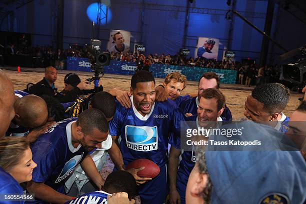 Michael Strahan attends DIRECTV'S Seventh Annual Celebrity Beach Bowl at DTV SuperFan Stadium at Mardi Gras World on February 2, 2013 in New Orleans,...