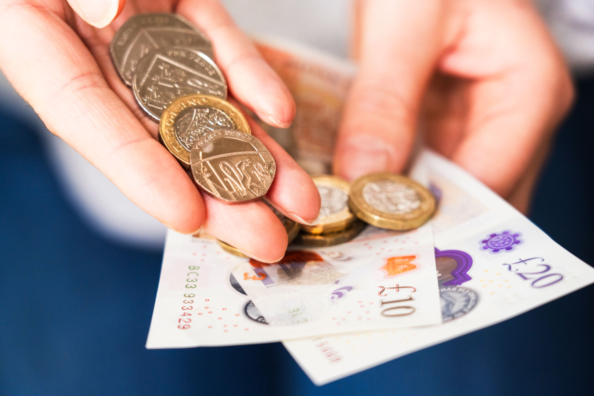Showing UK coins and notes Showing UK coins and notes