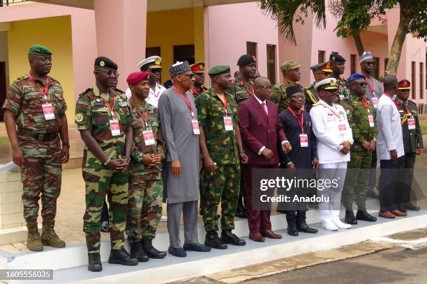 Chiefs of staff of the Economic Community of West African States pose for a photo after the meeting to find a solution to the governance crisis in...