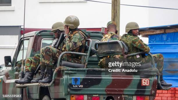 Security forces take safety precaution around the headquarter, where the meeting organized by chiefs of staff of the Economic Community of West...