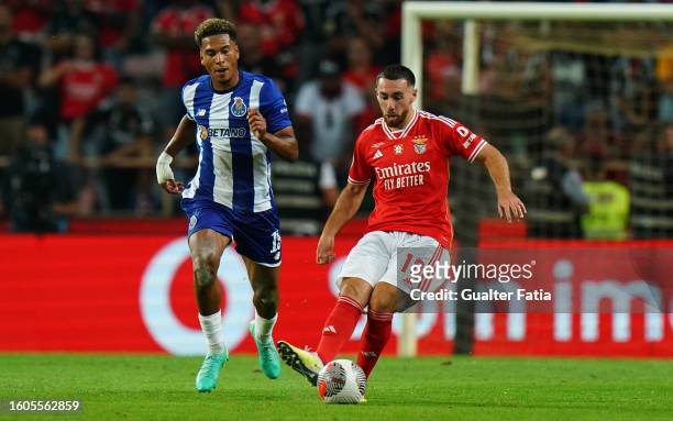 Orkun Kokcu of SL Benfica with Danny Namaso of FC Porto in action during the SuperTaca de Portugal match between SL Benfica and FC Porto at Estadio...