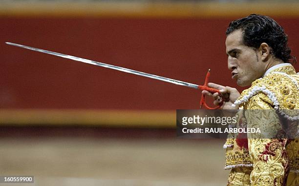 Spanish bullfighter Ivan Fandino performs during a bullfight at La Macarena bullring on February 2, 2013 in Medellin, Antioquia deparment, Colombia....