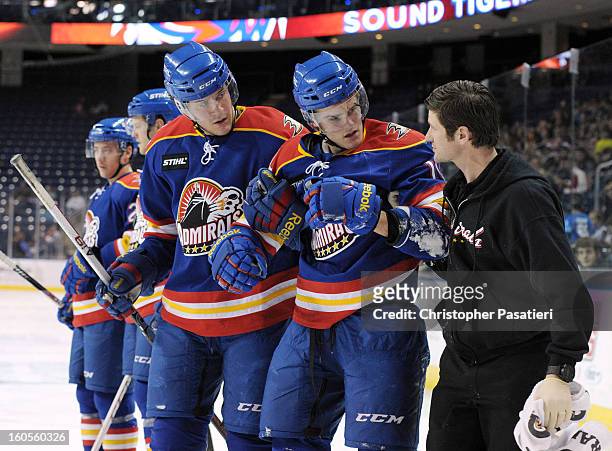 Gabe Guentzel of the Norfolk Admirals has to be helped off the ice after being injured during an American Hockey League game against the Bridgeport...