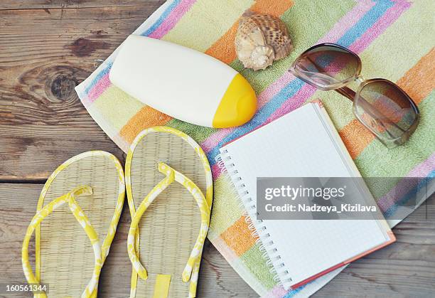 summer still life - beach towel stock pictures, royalty-free photos & images