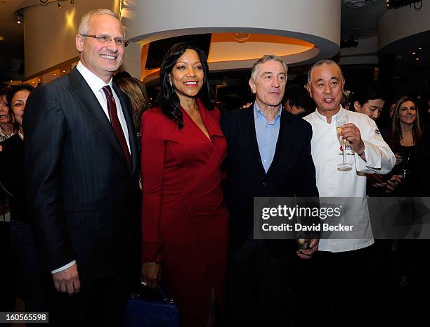 Caesars Palace President Gary Selesner , Grace Hightower De Niro, actor Robert De Niro and chef Nobu Matsuhisa appear during a preview for the Nobu...