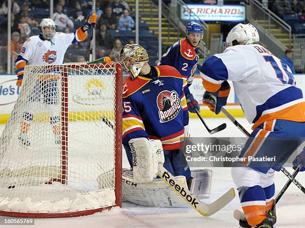 Igor Bobkov of the Norfolk Admirals looks back after allowing a goal to Brock Nelson of the Bridgeport Sound Tigers during an American Hockey League...