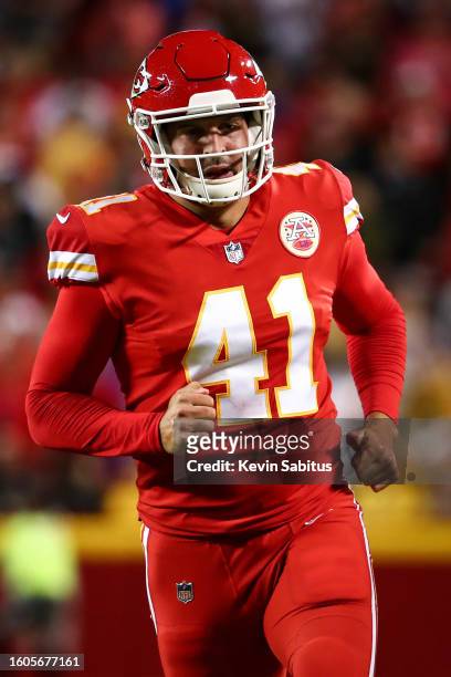 James Winchester of the Kansas City Chiefs talks with a teammate during an NFL game against the Buffalo Bills at GEHA Field at Arrowhead Stadium on...