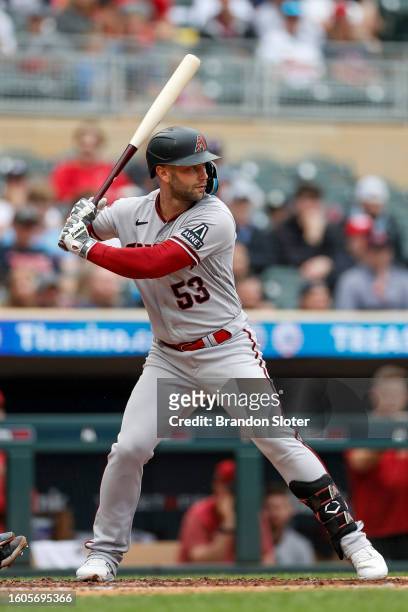 Christian Walker of the Arizona Diamondbacks bats in the third inning during a game against the Minnesota Twins at Target Field on August 6, 2023 in...