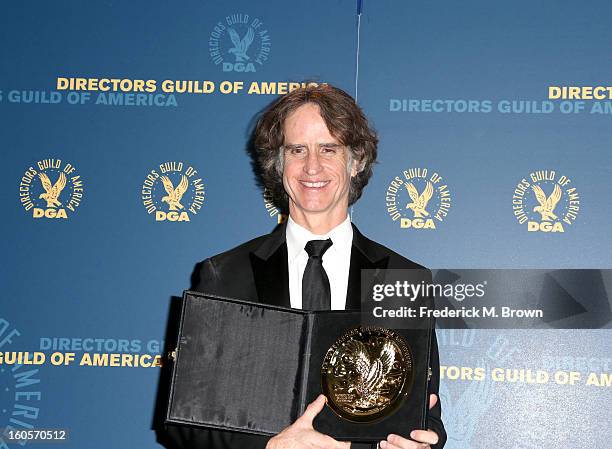 Director Jay Roach, winner of the Outstanding Directorial Achievement in Movies for Television and Mini-Series for "Game Change," poses in the press...