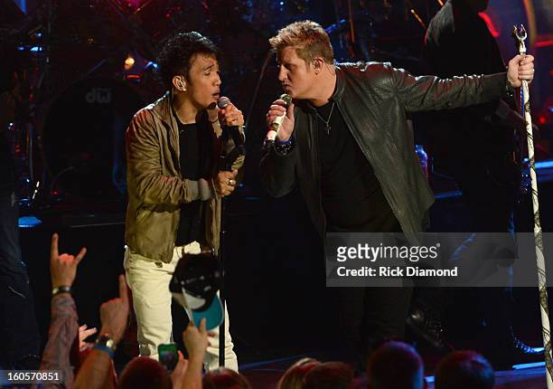 Arnel Pineda and Gary LeVox perform onstage as Journey and Rascal Flatts headline the Super Bowl XLVII CMT Crossroads Concert on February 2, 2013 in...