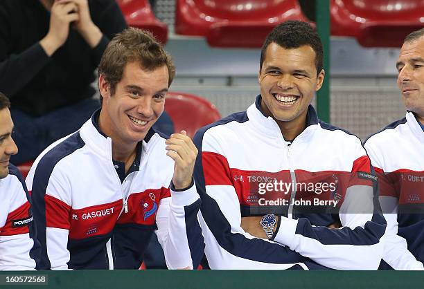 Richard Gasquet and Jo-Wilfried Tsonga of France share a laugh during the doubles match on day two of the Davis Cup first round match between France...