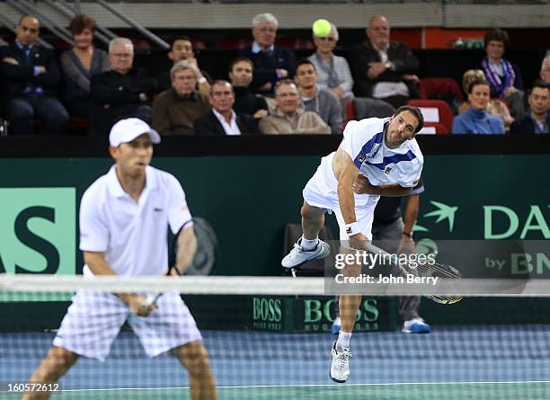 Dudi Sela and Jonathan Erlich of Israel in action during their doubles match against Julien Bennetteau and Michael Llodra of France on day two of the...