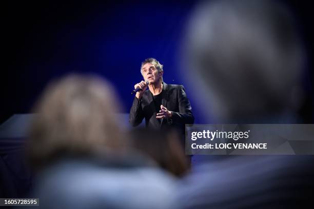 French singer Julien Clerc performs in La Baule, western France, on August 17 during the Dryadestivales music Festival. Julien Clerc's half brother,...