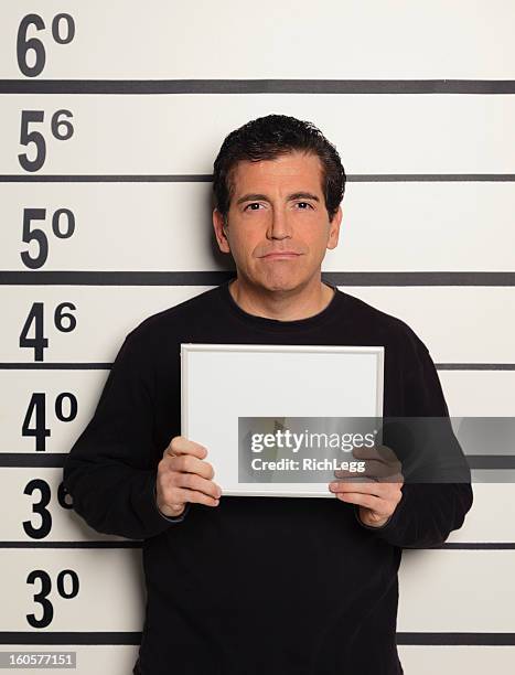 mugshot of a man - prison placard stock pictures, royalty-free photos & images