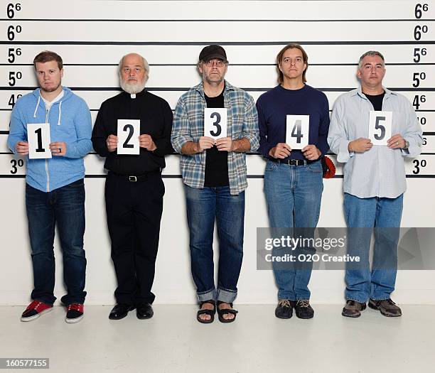 men in a police lineup - mugshot stockfoto's en -beelden