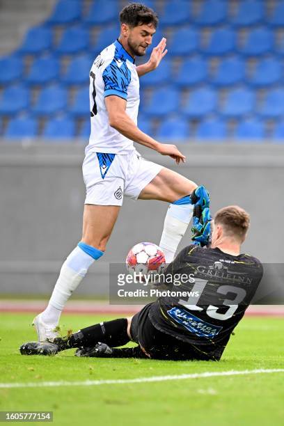Yaremchuk Roman forward of Club Brugge in duel with Audunsson Steinpor Mar goalkeeper of KA Akureyri and scores a goal during the UEFA Europa...