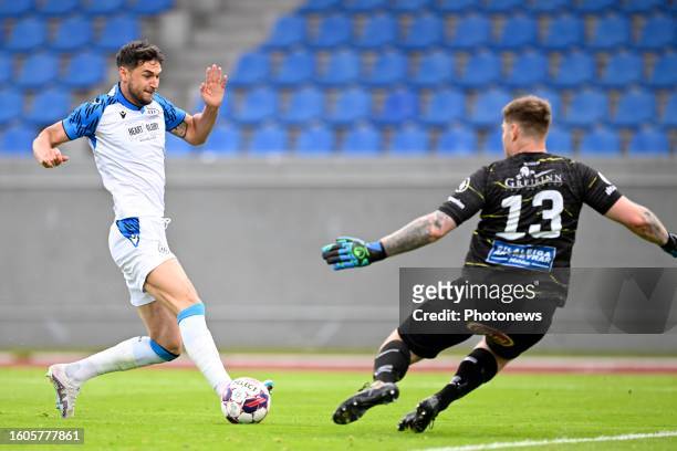Yaremchuk Roman forward of Club Brugge in duel with Audunsson Steinpor Mar goalkeeper of KA Akureyri and scores a goal during the UEFA Europa...