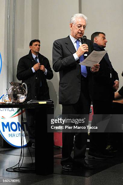 Italian Prime Minister Mario Monti delivers a speech during of Lombardy candidates of 'Scelta Civica con Monti per l'Italia' on February 2, 2013 in...