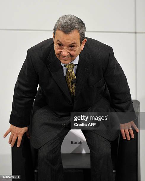 Israeli Deputy Prime Minister and Minister of Defence Ehud Barak takes his seat for a podium discussion on the third day of the 49th Munich Security...