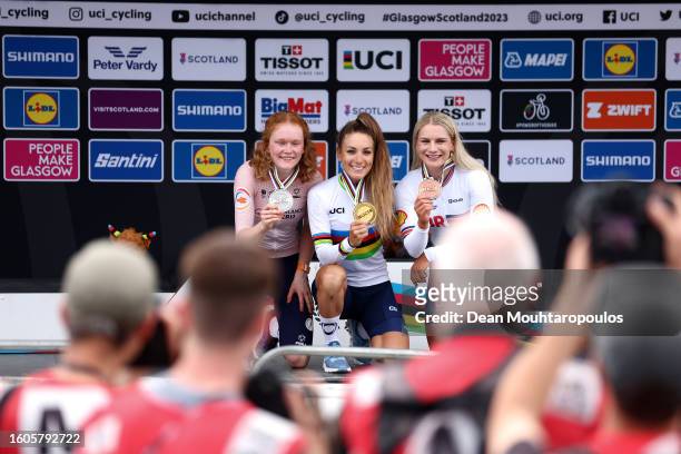 Silver medalist Puck Pieterse of Netherlands, gold medalist Pauline Ferrand Prevot of France and bronze medalist Evie Richards of Great Britain pose...