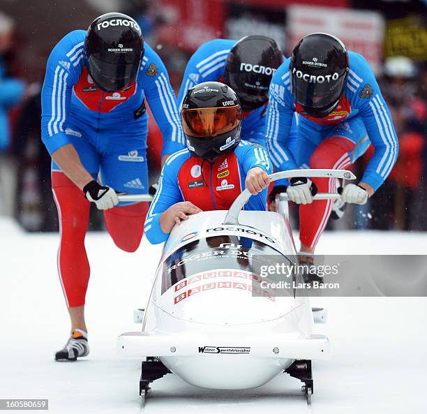 Alexander Kasjanov, Petr Moissev, Maxim Belugin and Kirill Antukh of Russia compete during the Four Men Bobsleigh heat three of the IBSF Bob &...