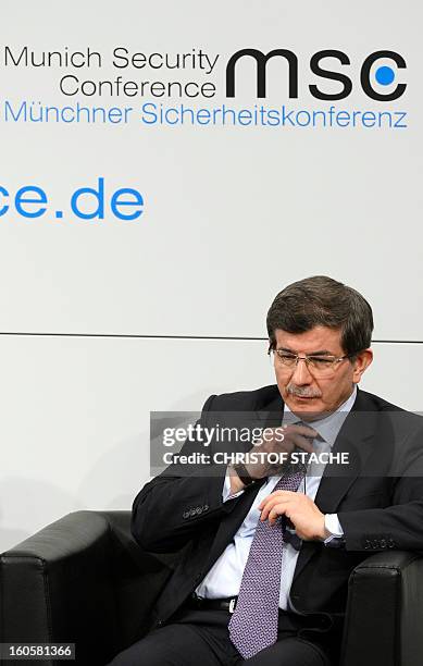 Turkish Foreign Minister Ahmet Davutoglu waits ahead a podium discussion on the third day of the 49th Munich Security Conference on February 3, 2013...