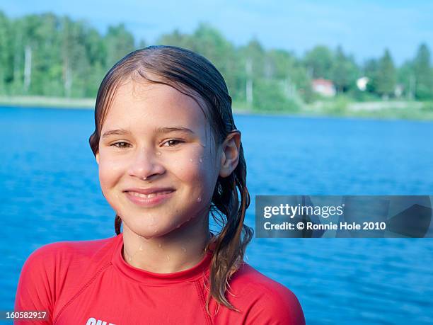 nordic girl portrait at lake. - porvoo stockfoto's en -beelden