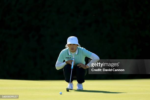 Amy Yang of South Korea lines up a putt on the 18th hole during the first round of the AIG Women's Open at Walton Heath Golf Club on August 10, 2023...