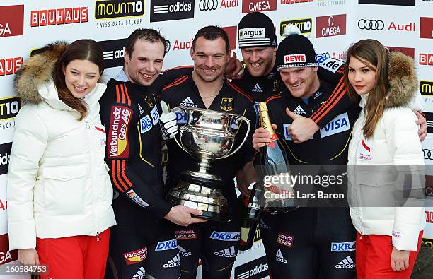 Maximilian Arndt, Marko Huebenbecker, Alexander Roediger and Martin Putze of Germany cellebrate after the Four Men Bobsleigh final heat of the IBSF...