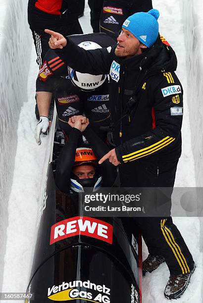 Maximilian Arndt of Germany cellebrates after the Four Men Bobsleigh final heat of the IBSF Bob & Skeleton World Championship at Olympia Bob Run on...