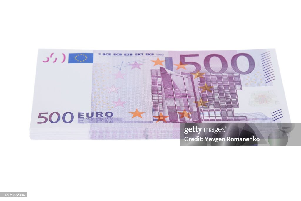 Stack of 500 euro bills, isolated on white background