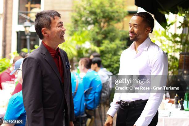 Kazunori Yamauchi, CEO of Polyphony Digital embraces Jann Mardenborough, Racing Driver and 2011 GT Academy winner prior to the Gran Turismo World...