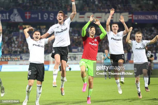 Artur Jedrzejczyk, Tomas Pekhart, Bartosz Slisz and Patryk Kun of Legia Warschau celebrate during the UEFA Europa Conference League Third Qualifying...